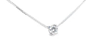 Classic Diamond Pendant in a Half Bezel Invisible Pave Setting - .6 Carat