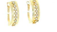 Diamond Row Oval Gold Huggie Earrings - .25 Carat