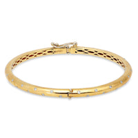 0.33 carat Chunky white diamonds bangle in 14k yellow gold