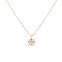 1.12 Classic Halo diamond pendant set in 18K rose gold Center Diamond: Weight: 1.01 Shape: Round Color: D Clarity: SI2 Side Stones: 0.11 Carat micro pave setting