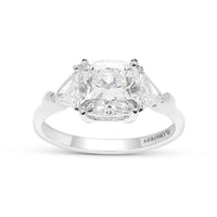 Cushion Cut Engagement Ring Featuring Trilliant Side Stones