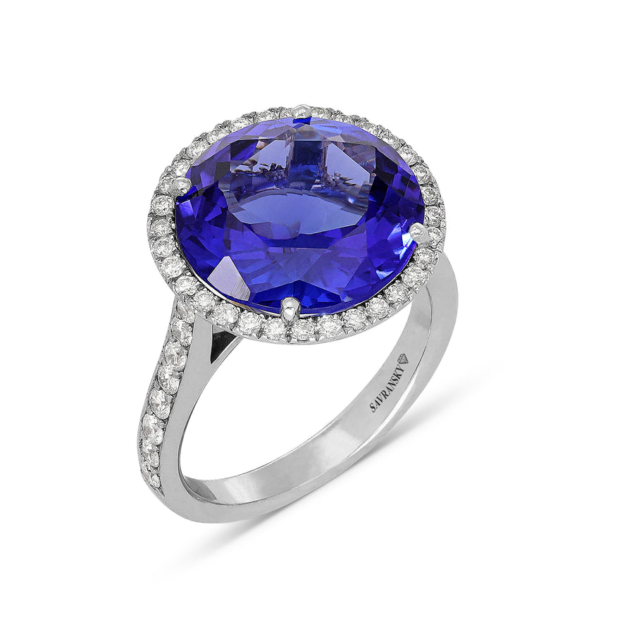 7.90-carat round-cut Violet Blue Tanzanite ring with micro pave weighing 0.81 carats, set in and 18K white gold.