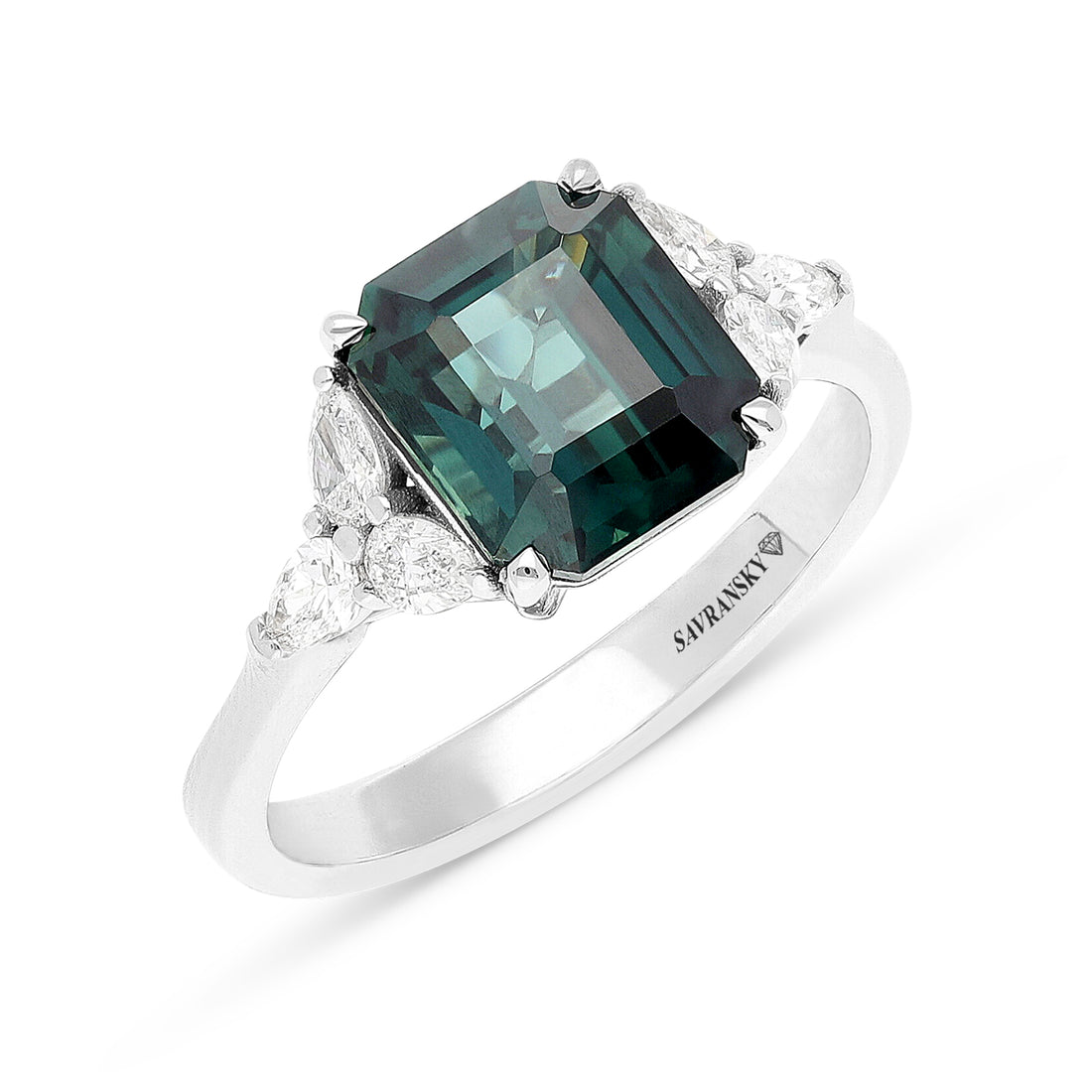3.92 carat Emerald cut Green Sapphire ring with 6 Pear Shape diamond side stones  in a total of 0.46 carats