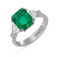 Green Emerald with Trillion Side Stones Birthstone Ring